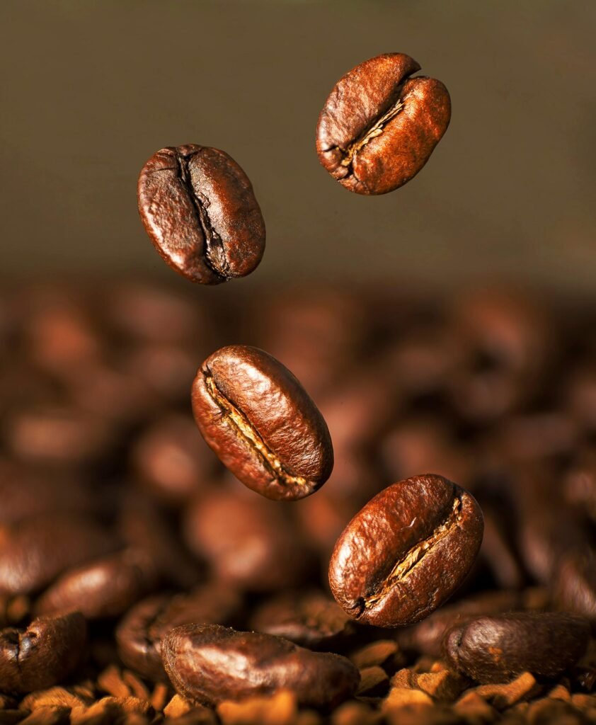alt="Image of falling coffee pieces"