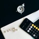alt="Picture of Calculator financial docs and clock"