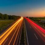 alt="Image of Open road with time lapsed lights"