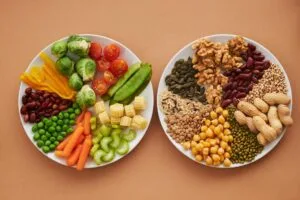 alt="Image of Plates of vegetables and nuts"