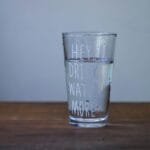 alt=”Image of Water glass with drink water more written on the side”