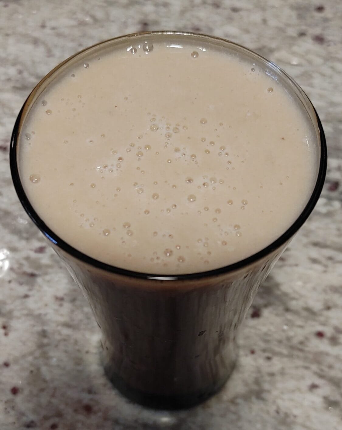 alt="Apple Banana Smoothie in a glass cup"