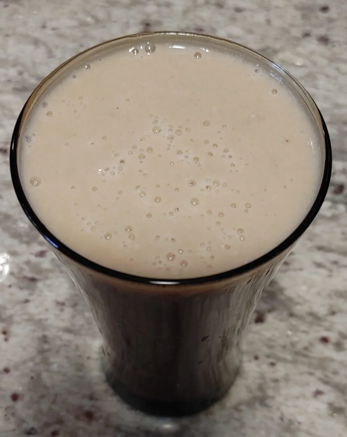 alt="Apple Banana Smoothie in a glass cup"