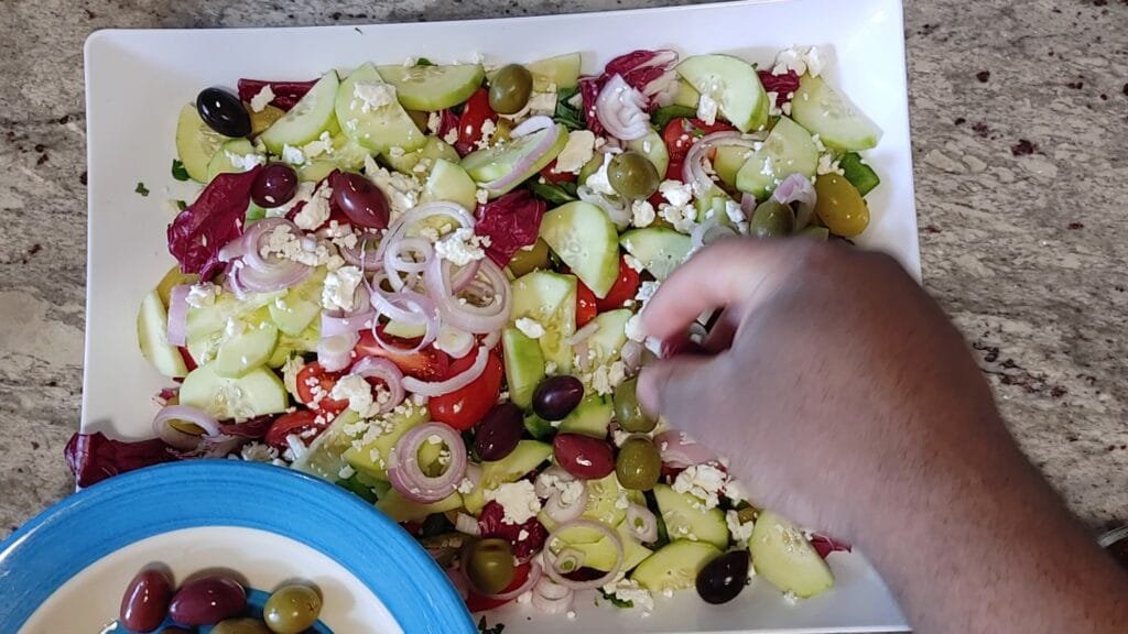 alt="Adding Olives"