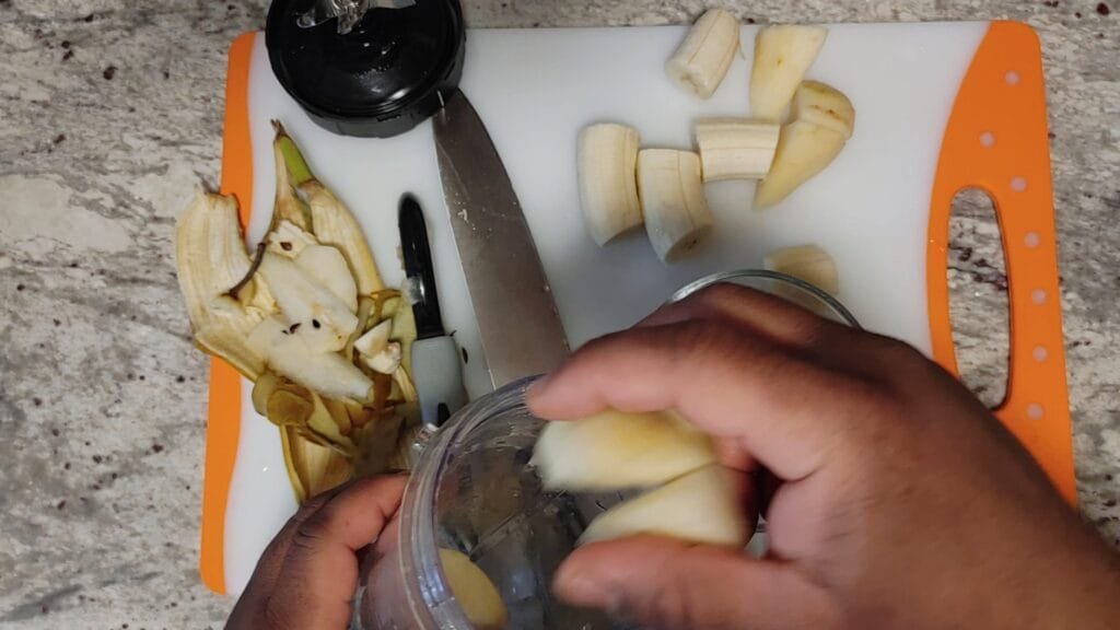 alt="Adding Pear pieces into blender"