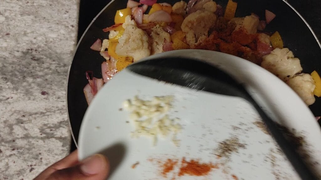 alt="Adding Salt to pan"