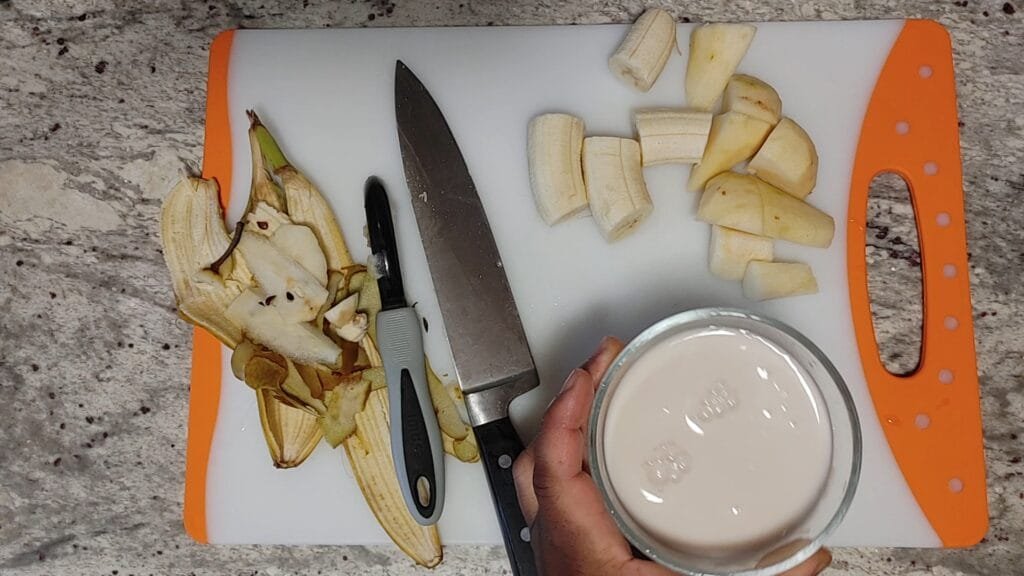 alt="Pour cup of Almond milk into bowl"