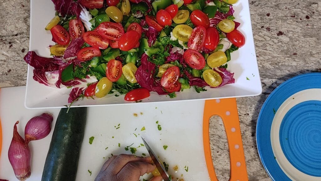 alt="Slicing Yellow and Red Cherry Tomatoes"