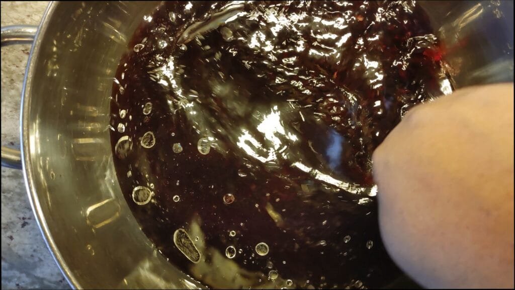 alt="Stirring Black Rice"