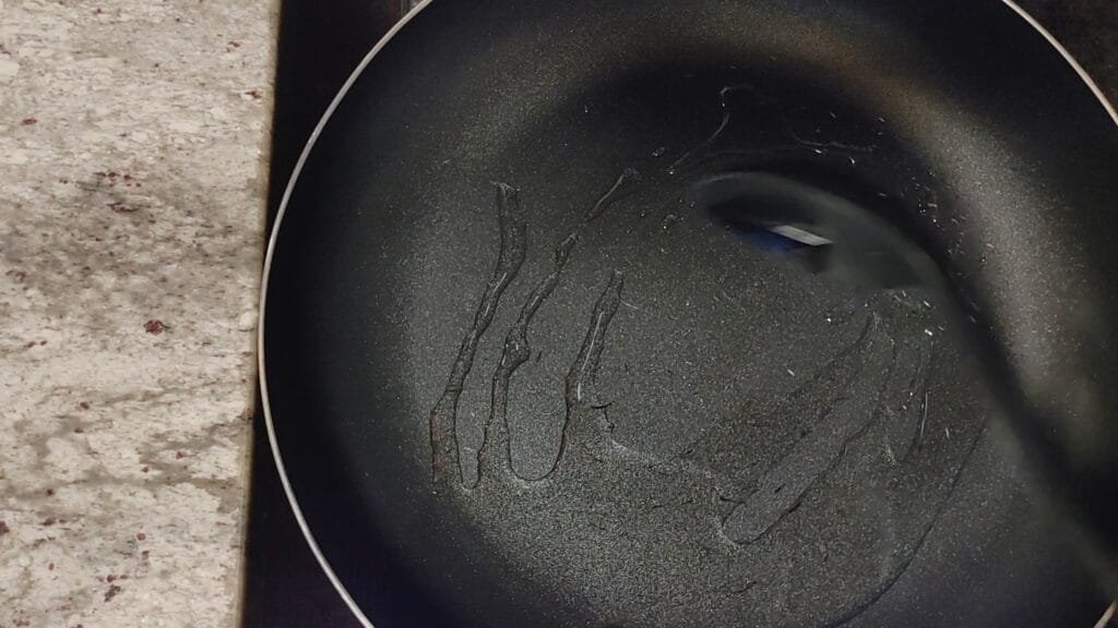 alt="Stirring Oil pan"