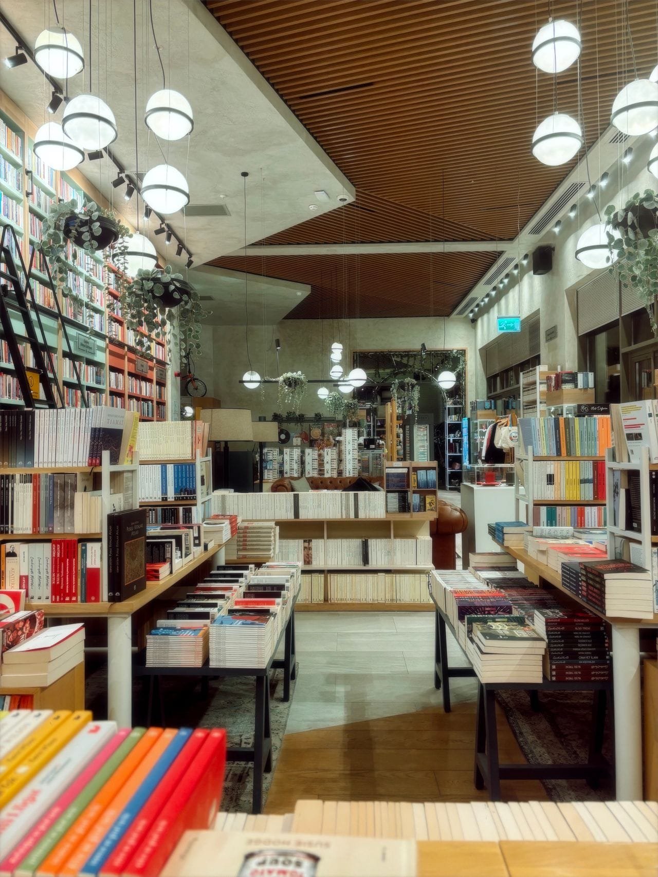 alt="Book store with lots of lights"