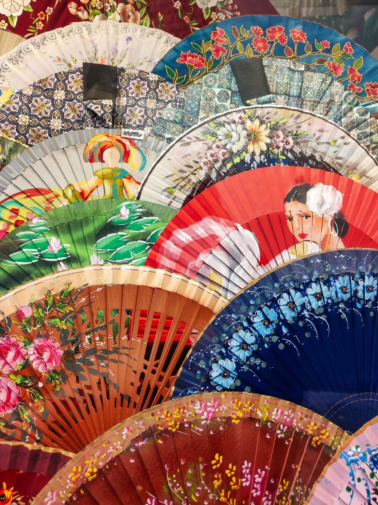 alt="Hand fan designs"
